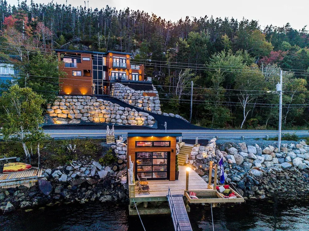  Modern waterfront home in Halifax with a private pool hot tub and scenic hillside views