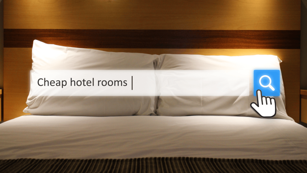 A cozy hotel bed with a search bar overlay displaying the phrase "Cheap hotel rooms," representing a search for affordable accommodations in Edinburgh near Waverley Station.