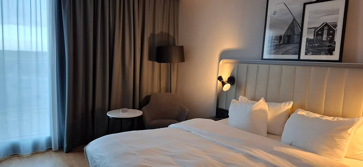 A sleek and modern room at the Radisson Hotel  Conference Centre Oslo Airport designed for comfort and convenience perfect for travelers seeking proximity to Oslo Airport