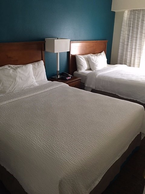 Residence Inn Norfolk Airport - Cozy double bed setup in a modern hotel room near Norfolk Airport perfect for families and business travelers