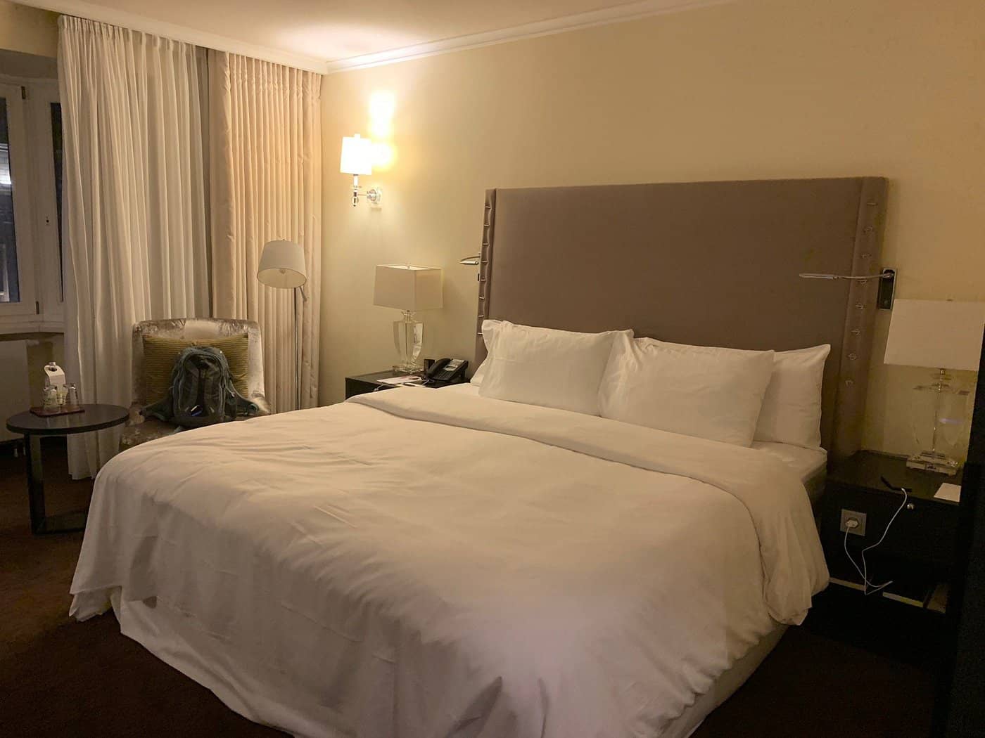 The Westin Grand Berlin features an elegant room with a plush king-sized bed and sophisticated decor